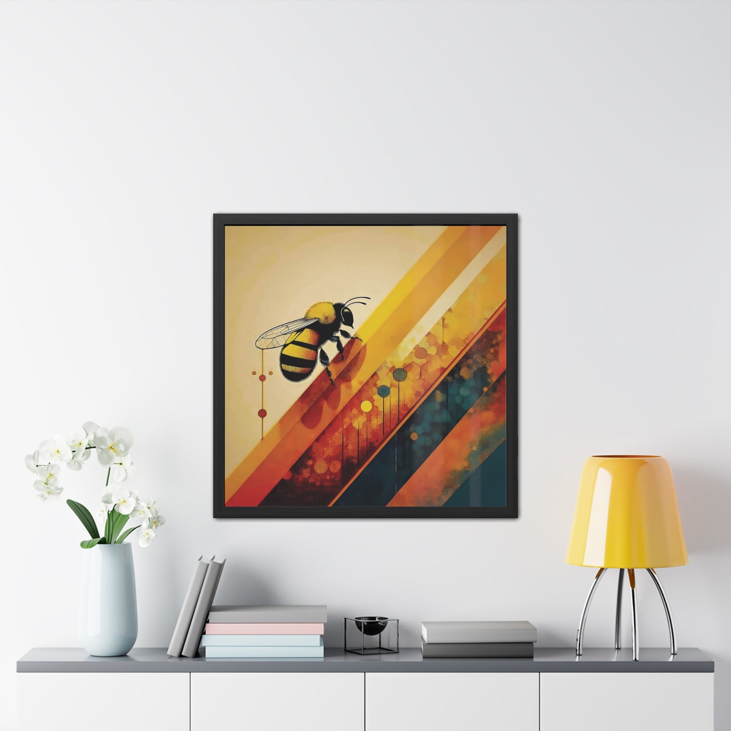A vibrant abstract bee on colorful geometric stripes, blending warm yellows, oranges, and teal. Framed Poster on a white wall.